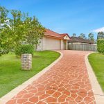 SPACIOUS 4 BEDROOM FAMILY HOME IN THE HEART OF UPPER COOMERA on 750 SQM WITH FLAT BACKYARD.